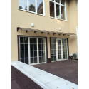 Canopy over the door, brown, with bronze polycarbonate, width 766 mm, Conos